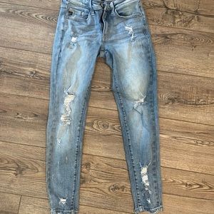 skinny jeans light wash with small rips size 24